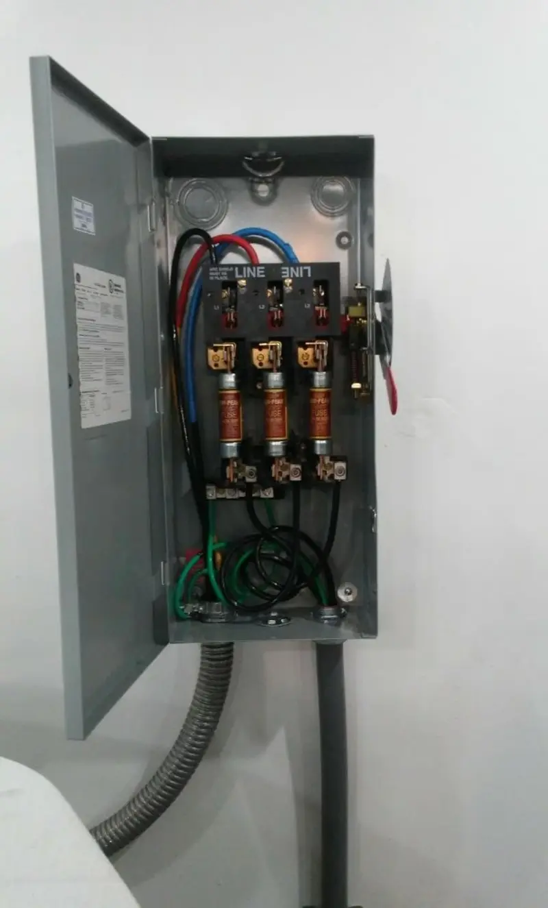 Three-phase disconnect switch installed for Smoke Detector Installation in Sanbornton